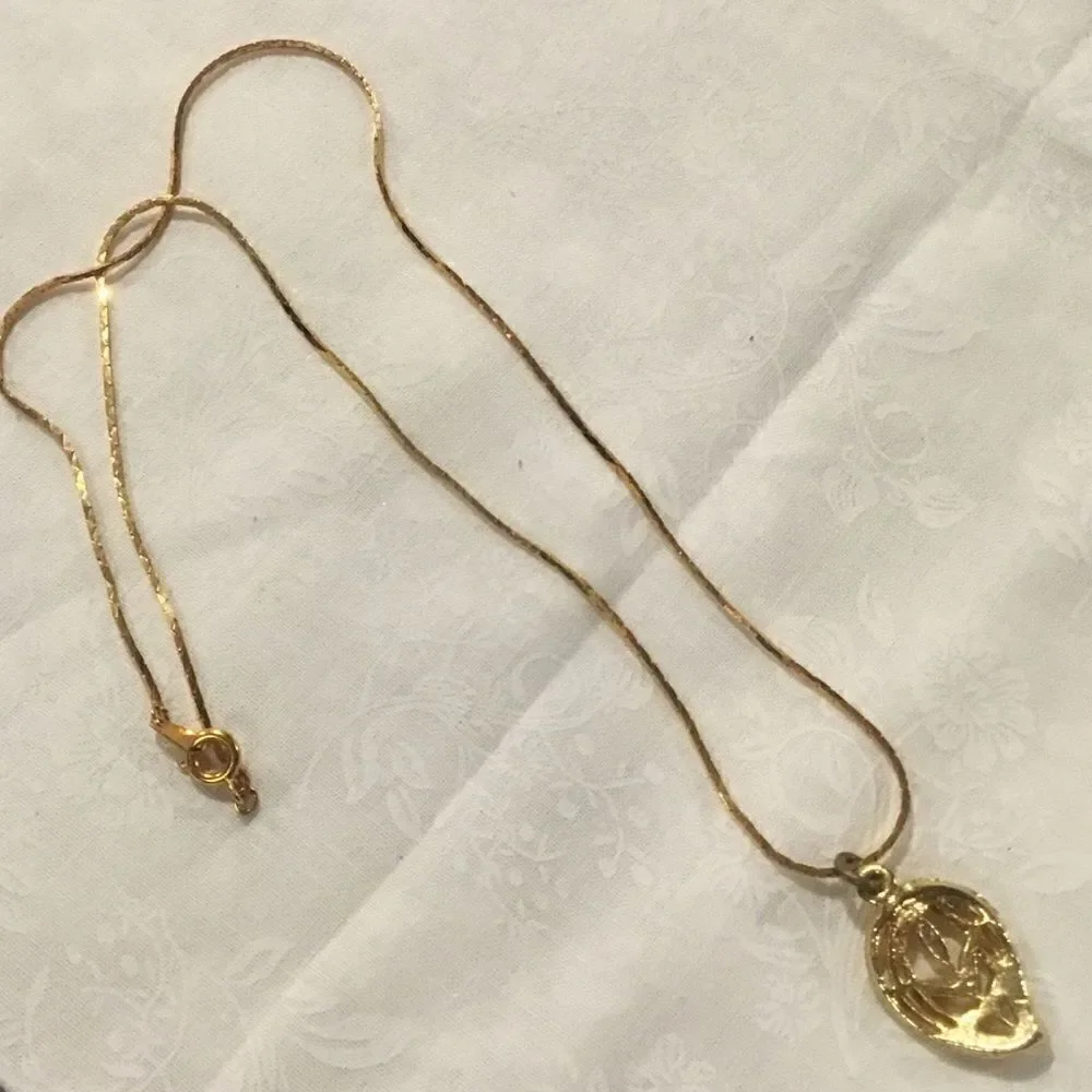 Goldtone Necklace With Leaf Pendant